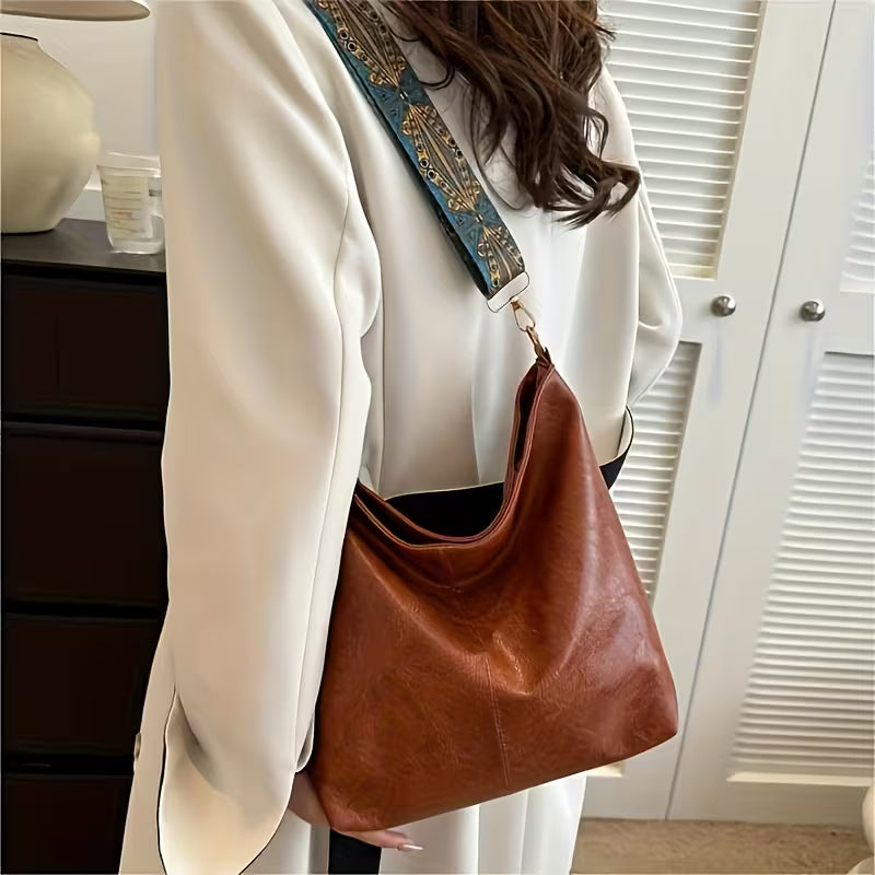 Large capacity shoulder bag with patterned handle - black or brown