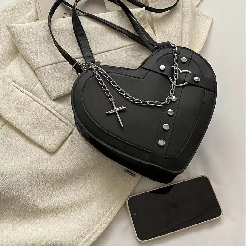 Heart shaped gothic/punk bag with metal studs and cross accessory