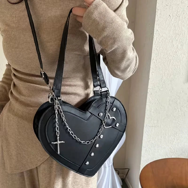 Heart shaped gothic/punk bag with metal studs and cross accessory